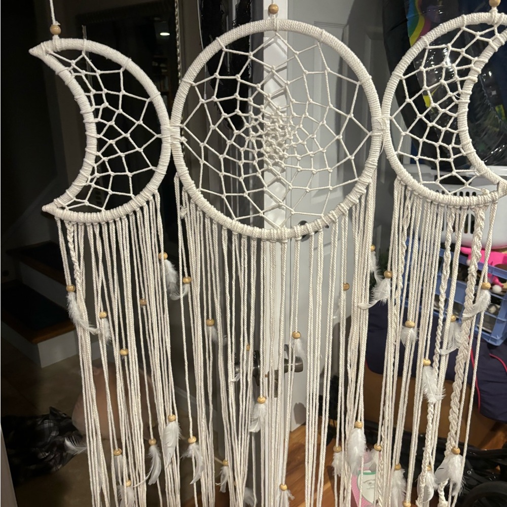 Sun and moon string hanger